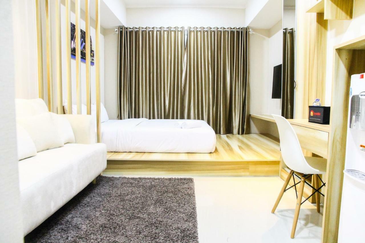 Modern Style The Oasis With Comfortable Sofa By Travelio * Cikarang